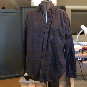 Dark blue plaid shirt.